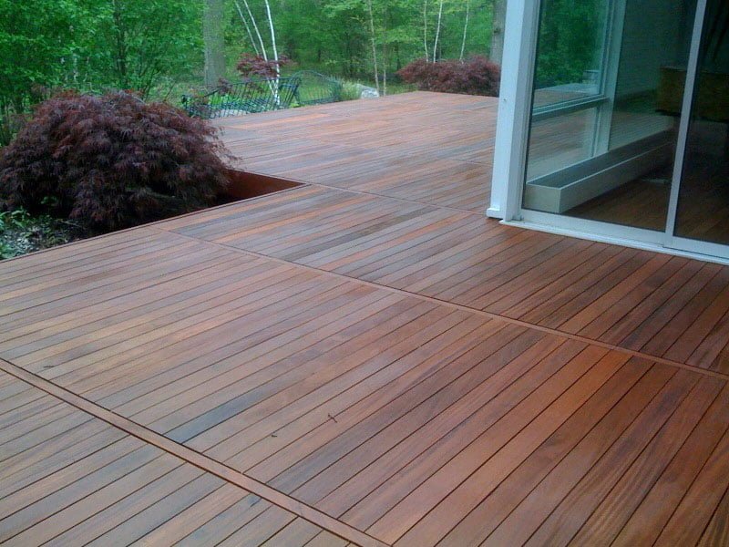 a deck with semi transparent stain aplayed by soca services