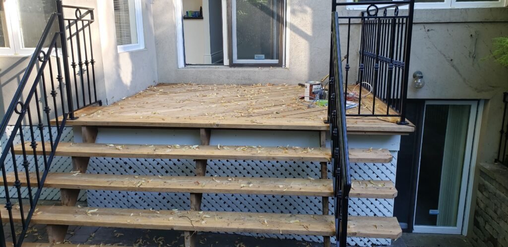 aplying stain to old deck