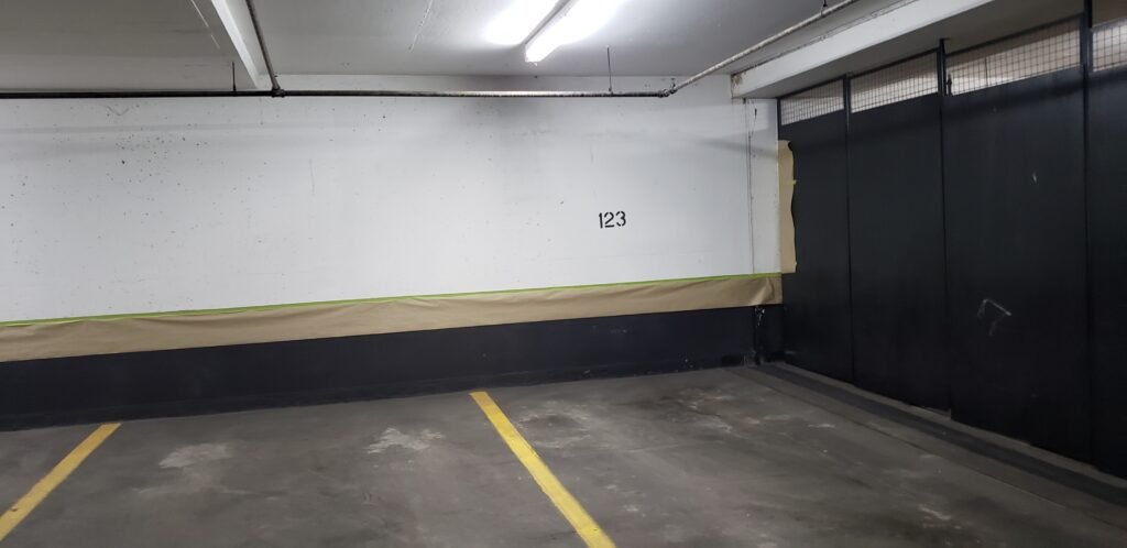 paper covering the parking lot for paint