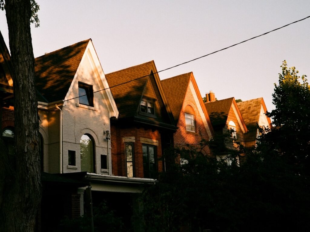 Toronto row houses at golden hour showcasing traditional brick architecture